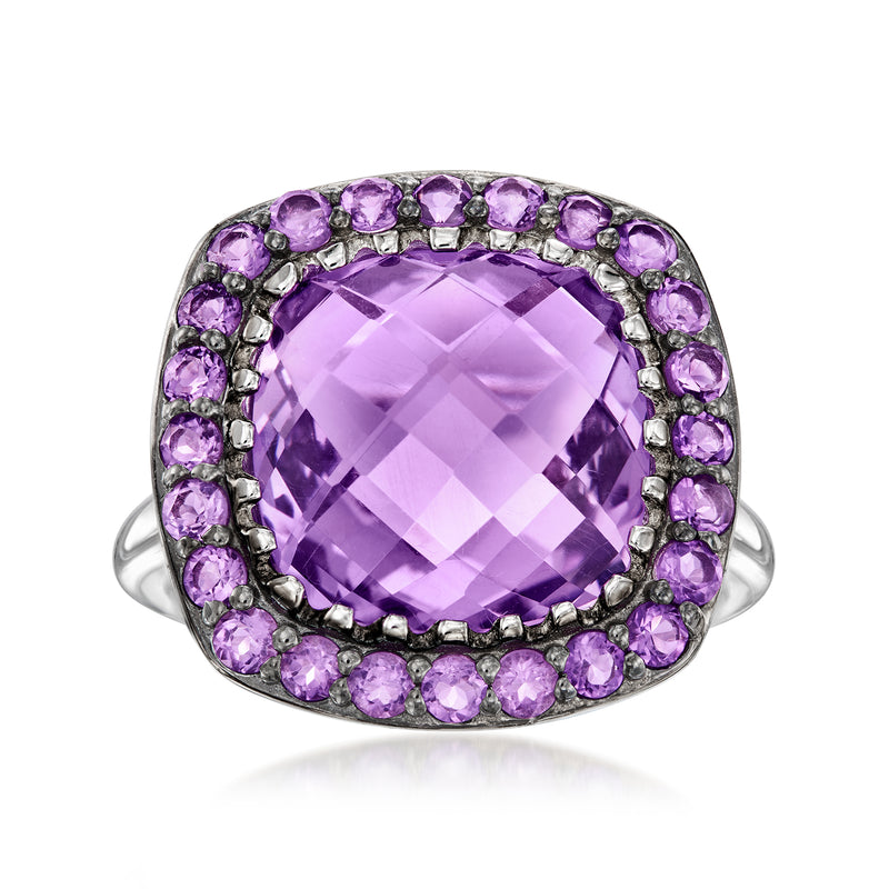 Amethyst ring with sterling silver halo of purple oval stones and a large cushion-cut center