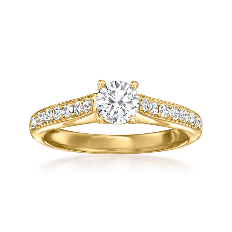 14kt yellow gold engagement ring with round center diamond and pave side stones