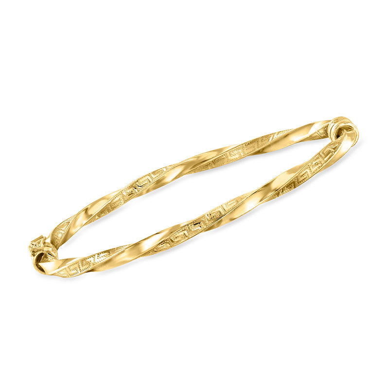 Gold-tone twisted bangle bracelet with Greek key pattern and clasp ends