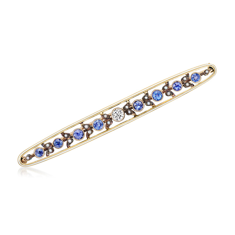 Vintage yellow gold bar pin with blue sapphires and small white diamonds