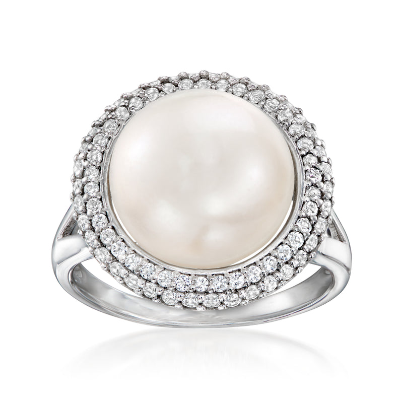 Sterling silver ring with white cultured pearl and round stone halo