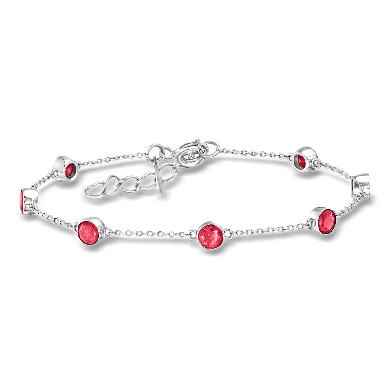 Sterling silver station bracelet with round ruby-red gemstones and clasp extender