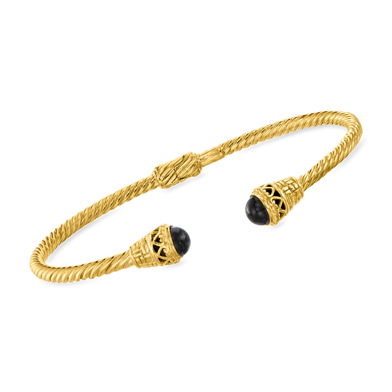 Twisted cuff bracelet in 18kt gold over sterling with black onyx end stones