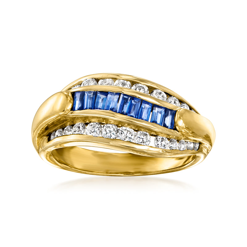 18kt yellow gold wave ring with blue sapphire center and white diamond accents