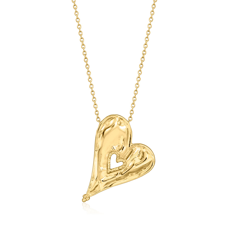 Gold-tone necklace with asymmetrical heart pendant on a fine chain