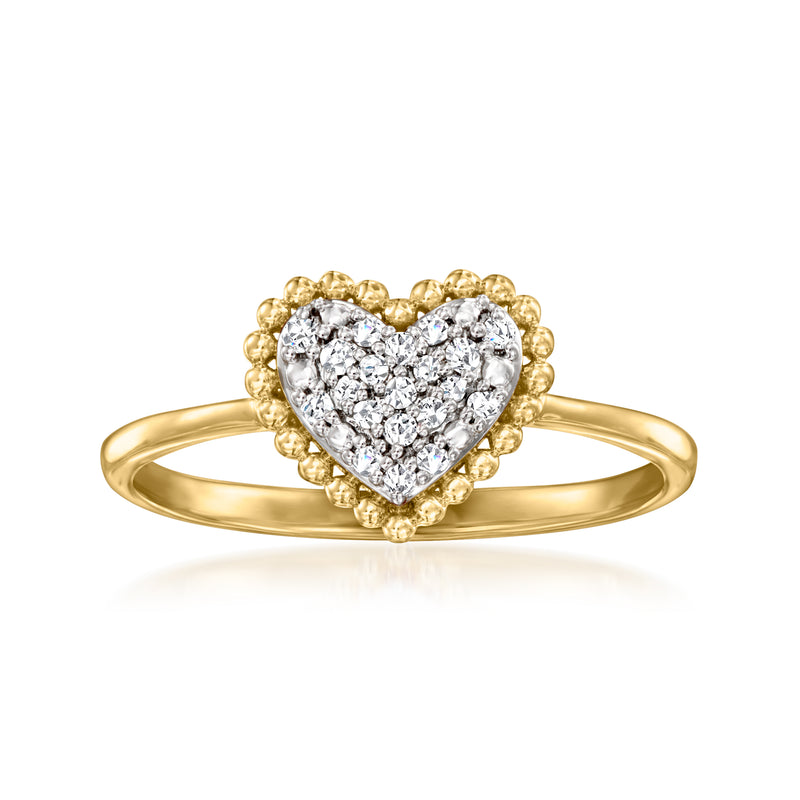 Heart-shaped pave diamond ring in 18kt gold over sterling, with gold halo