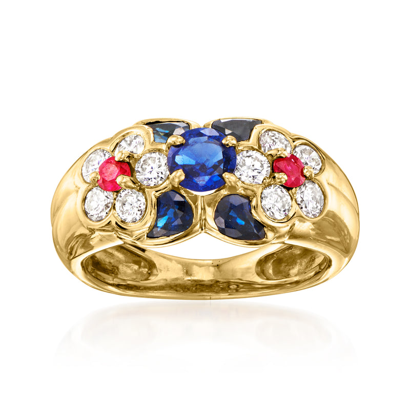 Vintage 18k yellow gold flower ring with oval blue sapphires, diamonds, and red ruby accents