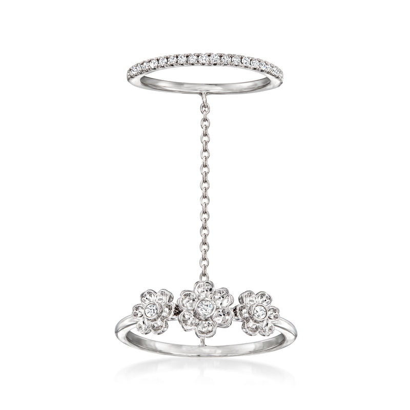 Sterling silver double ring with three diamond flower clusters, 0.15 ct t.w.