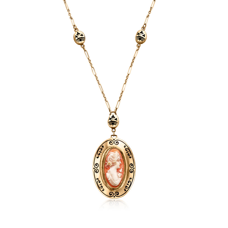 Vintage 10kt gold cameo necklace with oval orange shell pendant and black enamel accents