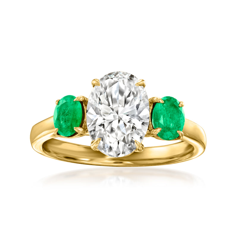 14kt yellow gold ring with round lab-grown diamond and two green emerald gemstones