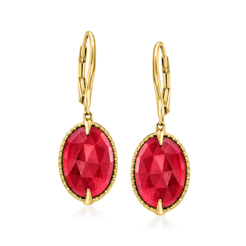 Gold leverback drop earrings with oval red gemstone, faceted bezel setting.