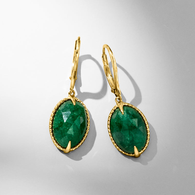 Gold leverback earrings with oval green gemstone drops, side view