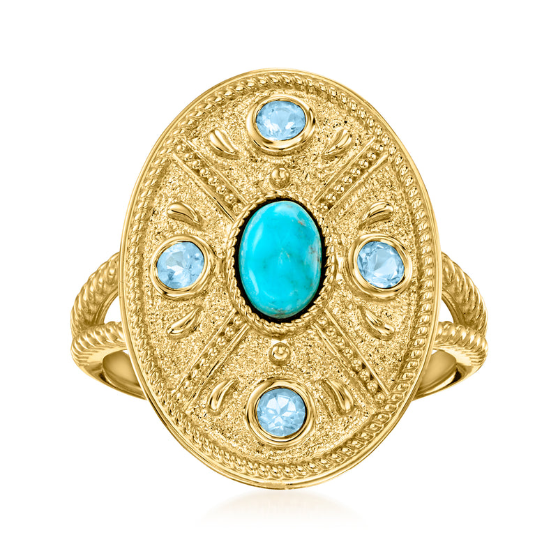 Gold over sterling oval ring with turquoise center and three round blue gemstones