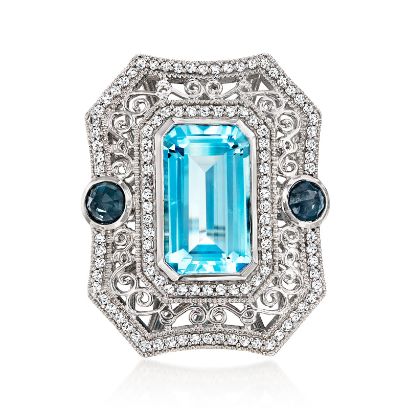 Sterling silver ring with sky blue rectangular topaz and round blue side stones