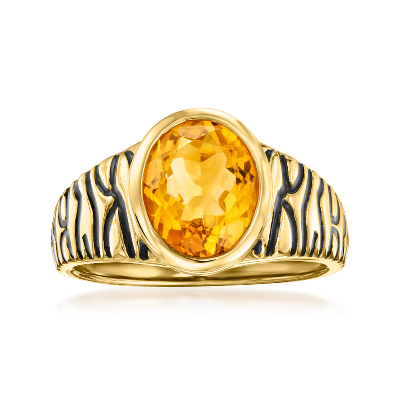 Gold ring with oval citrine gemstone center and black enamel animal-print sides