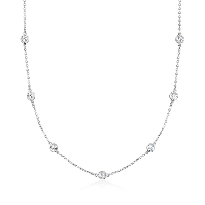 Sterling silver moissanite station necklace with five round crystal stations