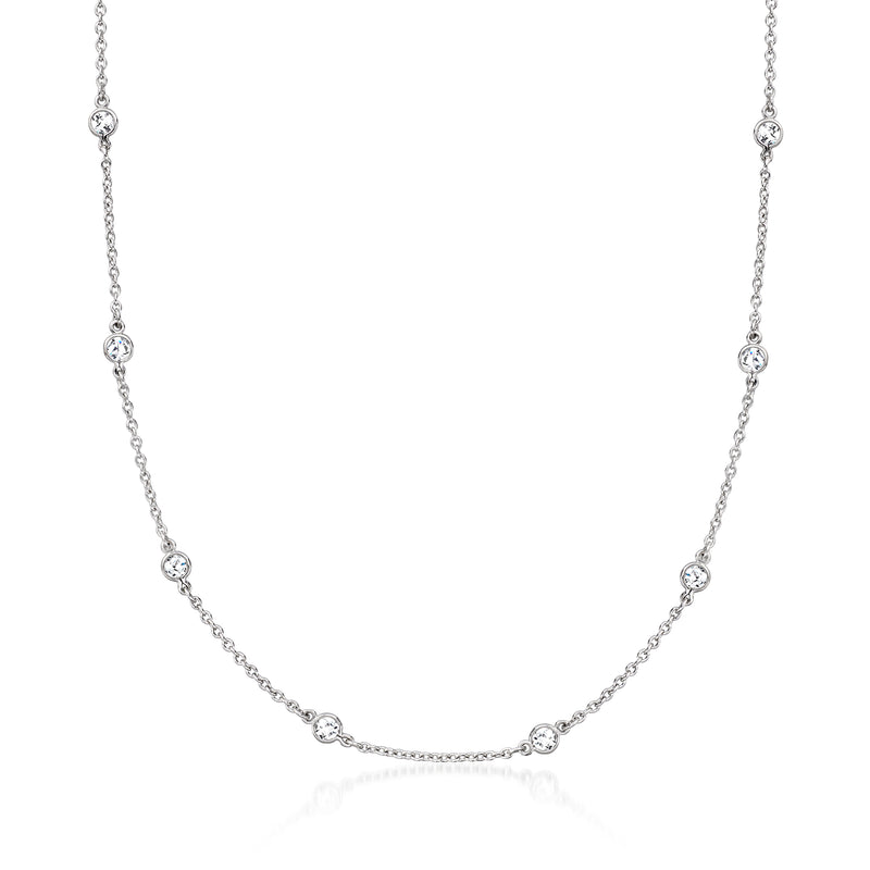 Sterling silver station necklace with round moissanite links in a line