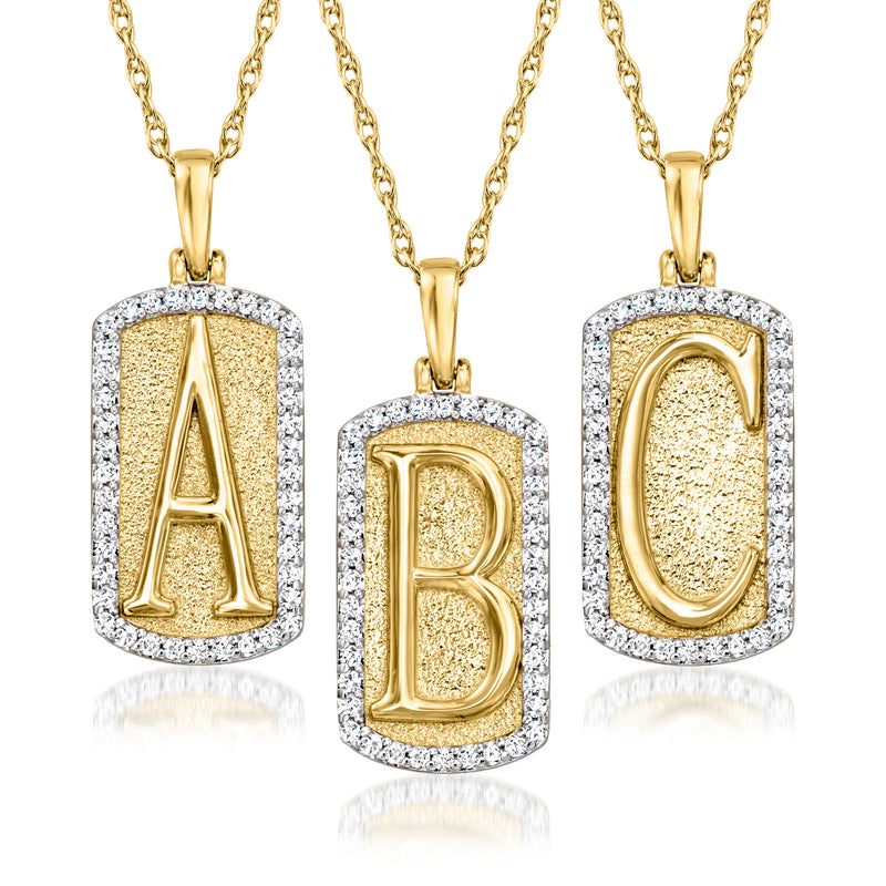 Gold initial dog tag pendant necklace with diamond-set initials A, B, and C