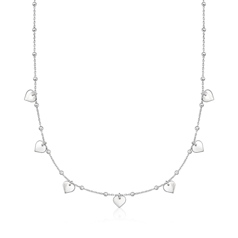 Sterling silver heart station necklace with small linked heart charms along chain