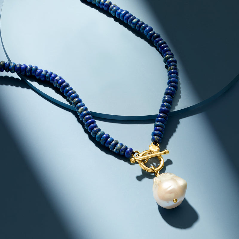 Lapis bead necklace with gold toggle clasp and baroque white pearl drop