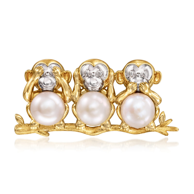 Gold-tone pendant with three monkey faces and white cultured pearl drops