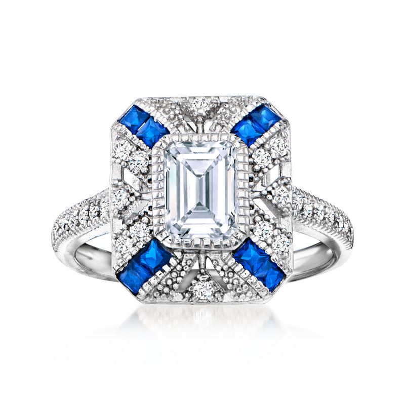 Sterling silver ring with emerald-cut center stone and blue simulated sapphire accents