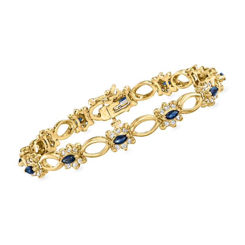 14kt yellow gold vintage bracelet with blue sapphires and diamond accents, oval links