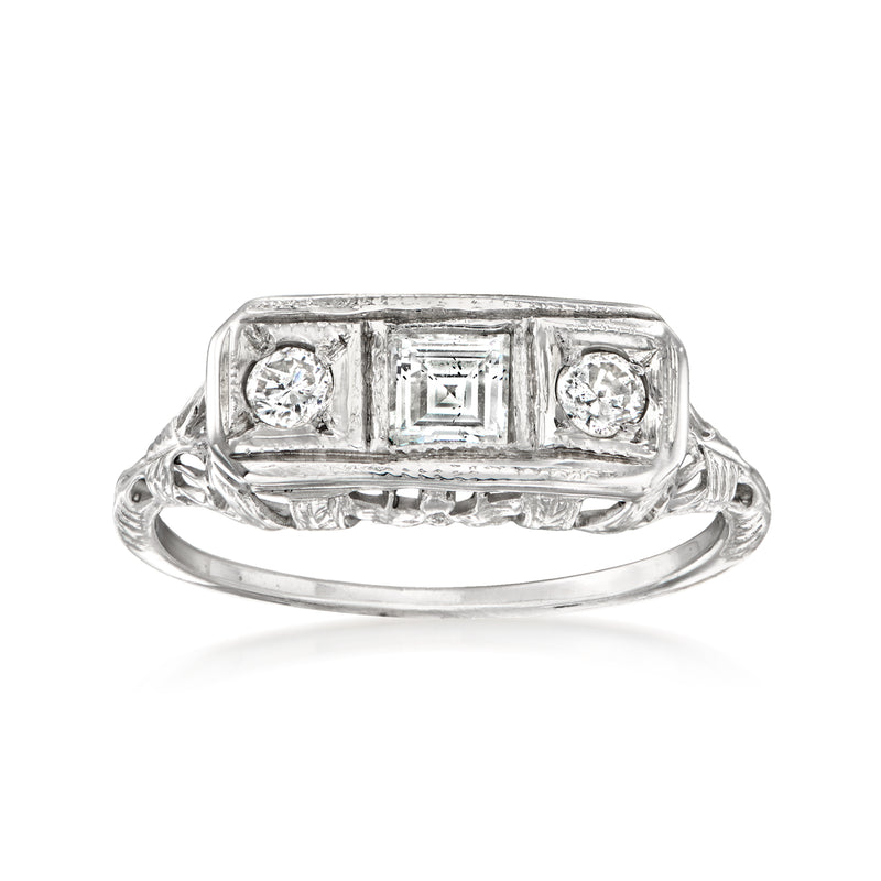 Vintage white gold ring with filigree top, rectangular diamond accents, round stones