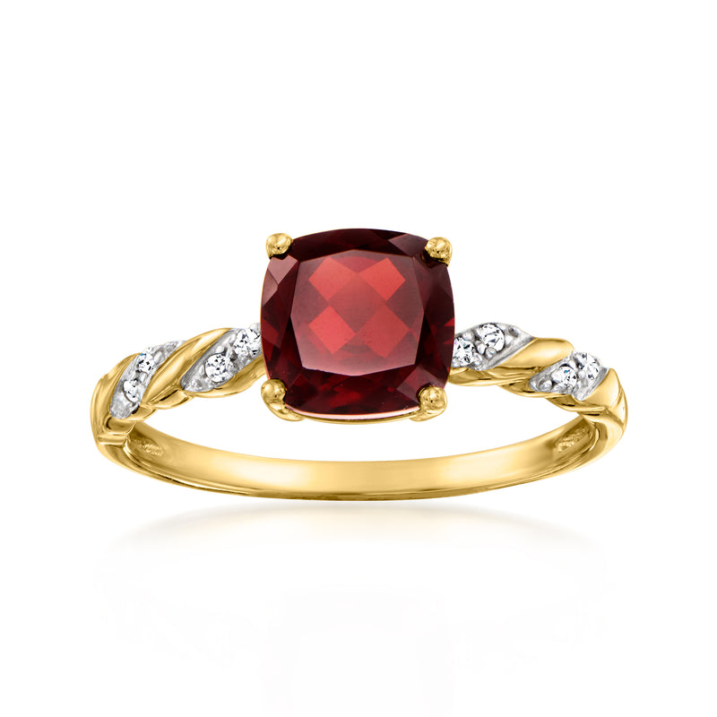 14kt yellow gold ring with cushion garnet center and diamond side accents