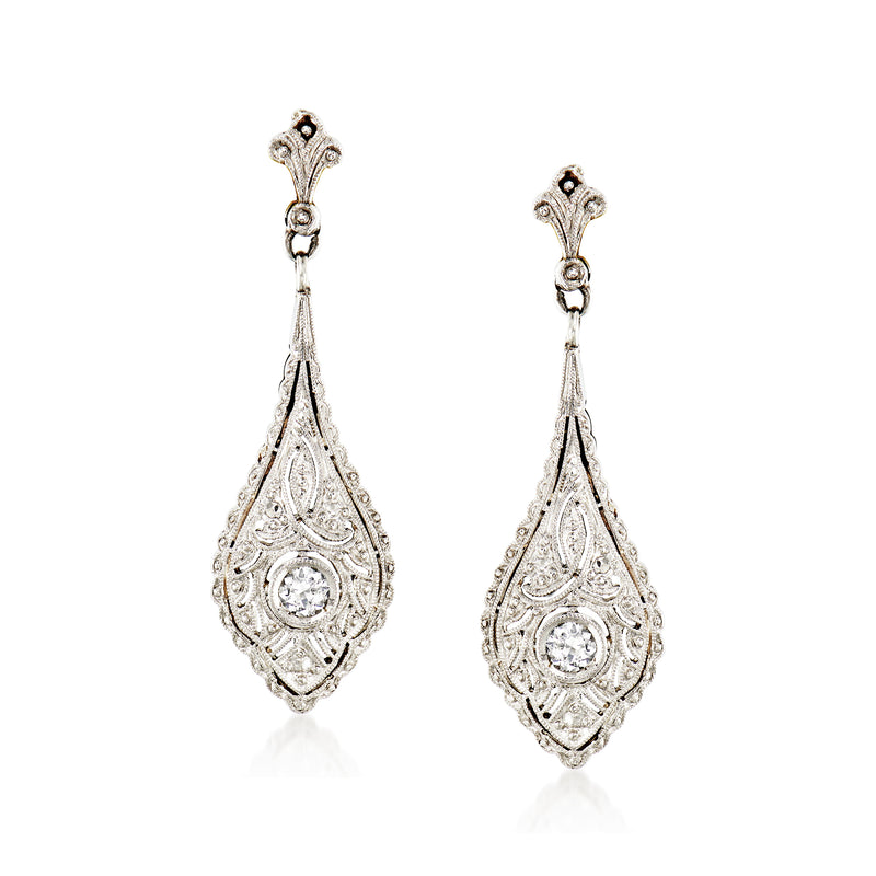 Platinum filigree teardrop drop earrings with round diamond accents and small center stones