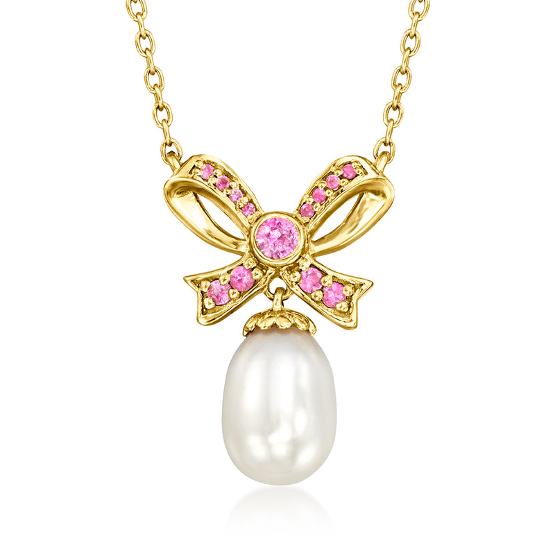 Gold bow pendant necklace with cultured pearl drop and pink sapphire gemstones