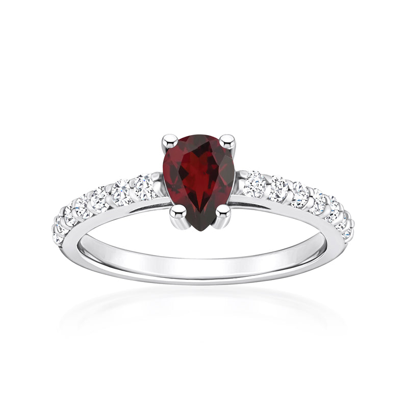 14kt white gold ring with oval garnet center and round diamond band