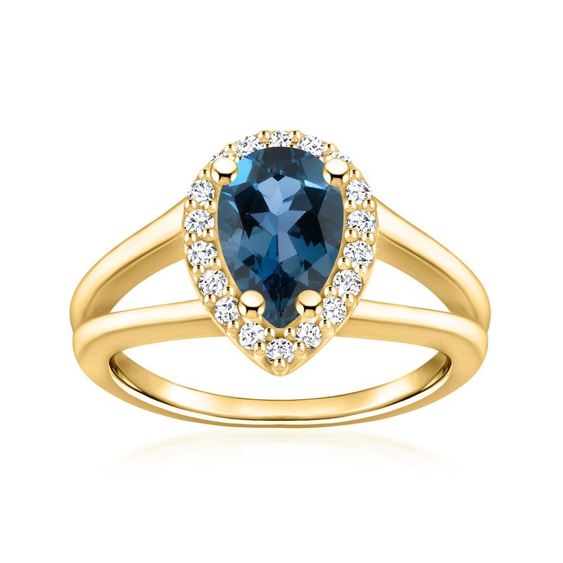 14kt yellow gold ring with oval London blue topaz and diamond halo