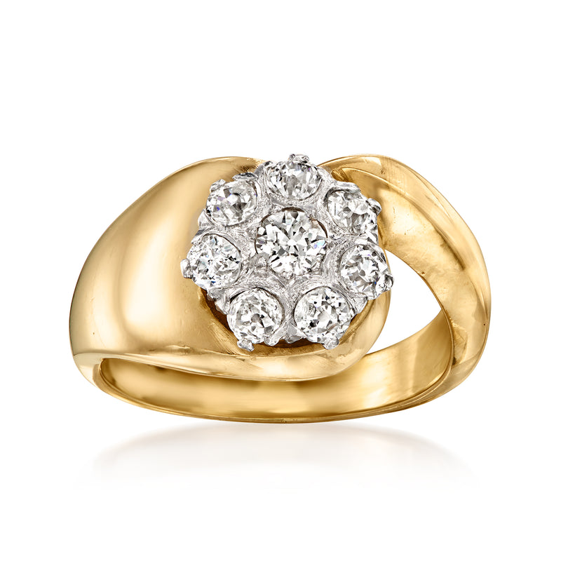 Vintage yellow gold diamond flower cluster ring with round stones on raised top