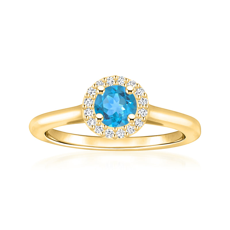 14kt yellow gold ring with blue topaz center and diamond halo, round setting