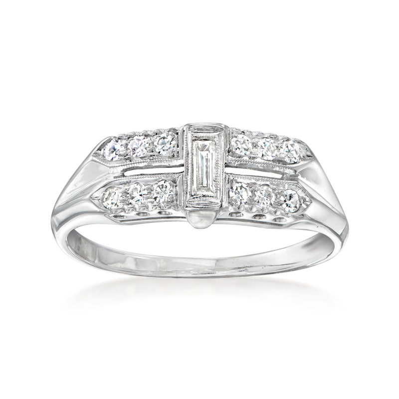Vintage 14kt white gold diamond ring with baguette center and round side stones