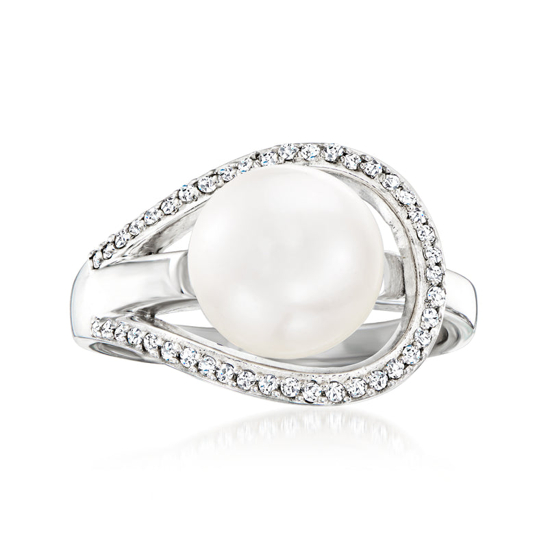 Sterling silver ring with white cultured pearl and halo of round diamond accents