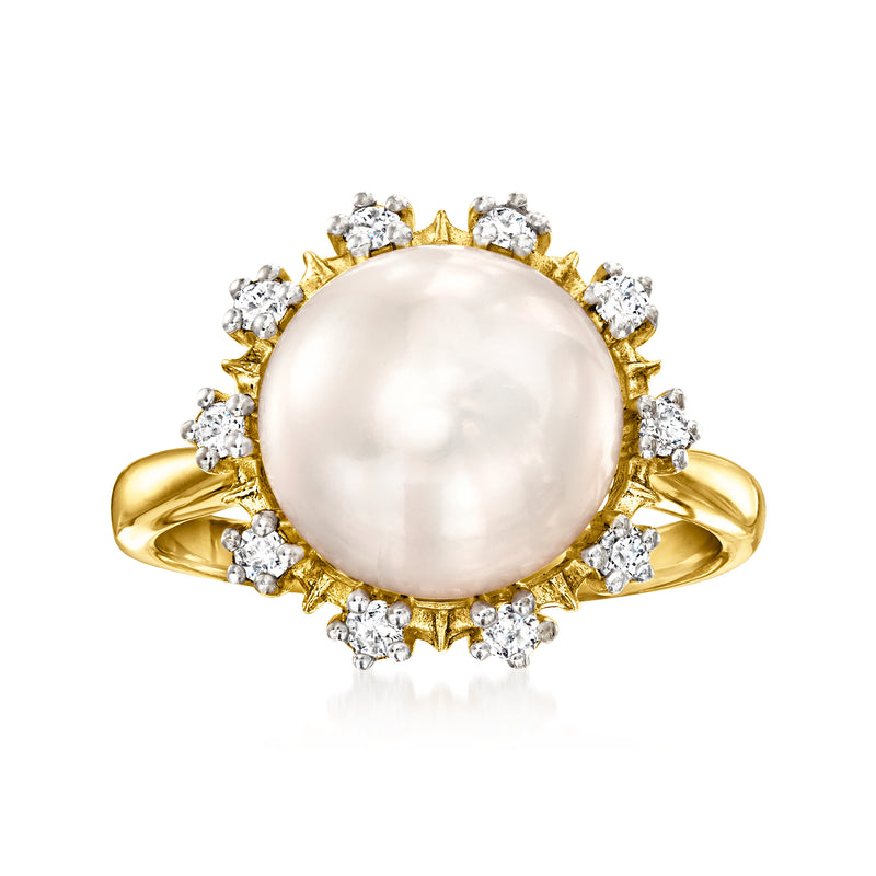 Gold flower ring with round cultured pearl center and small diamond-like stones halo
