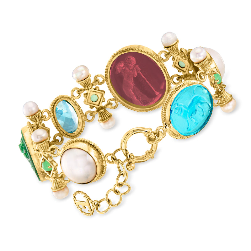 Gold-tone charm bracelet with marquise blue and oval red glass cabochons, pearl drops