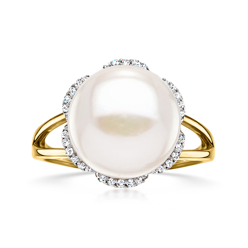 Gold ring with large white cultured pearl and round diamond halo