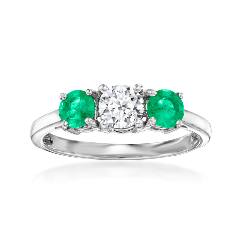 14kt white gold ring with round lab-grown diamond center and emerald side stones