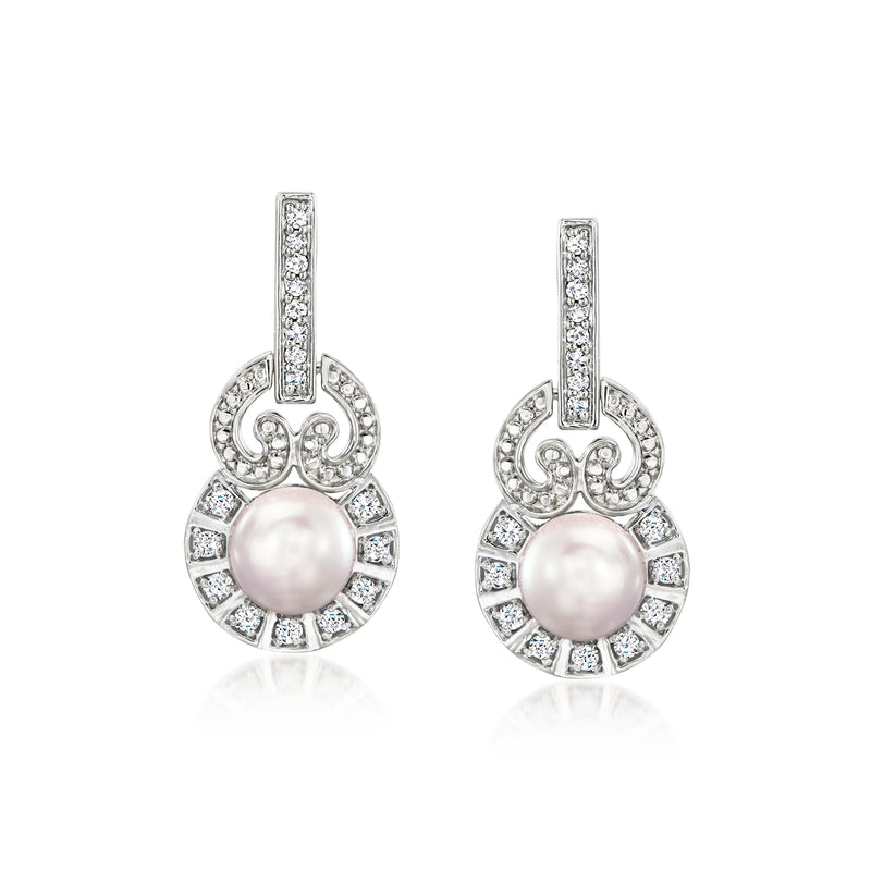 Sterling silver drop earrings with pink cultured pearl and diamond swirl accents