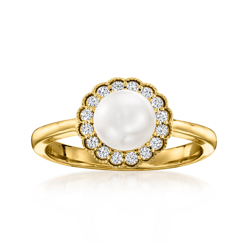 14kt yellow gold ring with round cultured pearl center and diamond halo