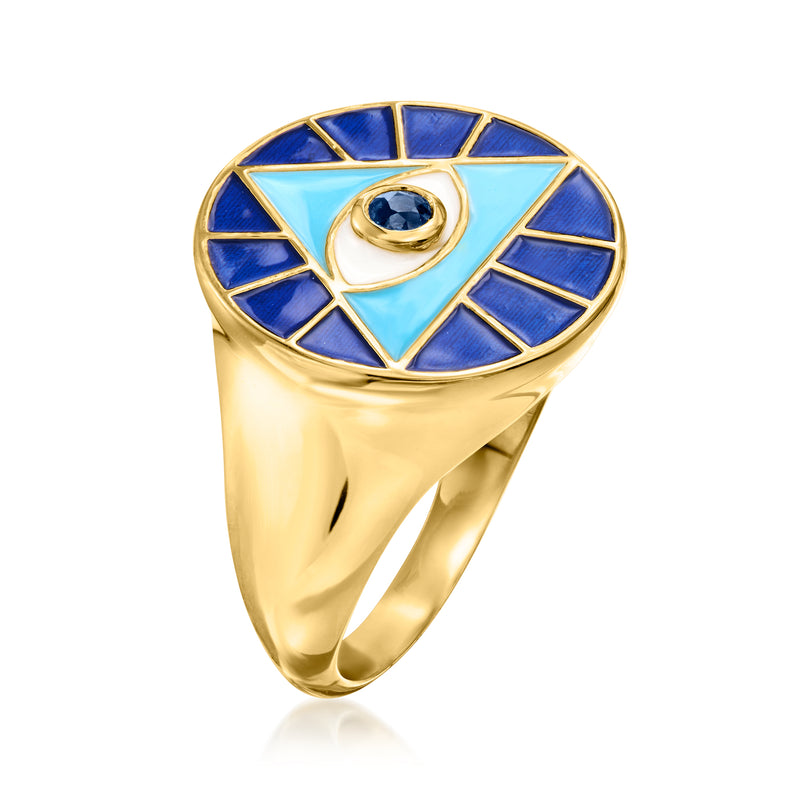 Gold-tone evil eye ring with blue sunburst bezel, white enamel center and round blue gem