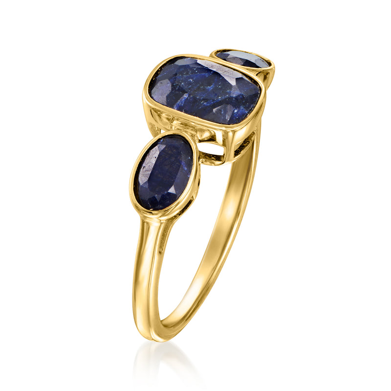 Gold over sterling three-stone sapphire ring with oval blue stones and open gallery