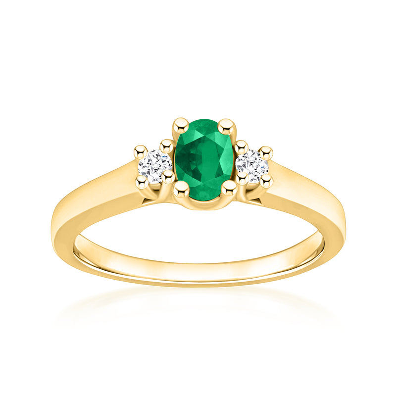 14k yellow gold ring with emerald-green oval center and four round diamond accents