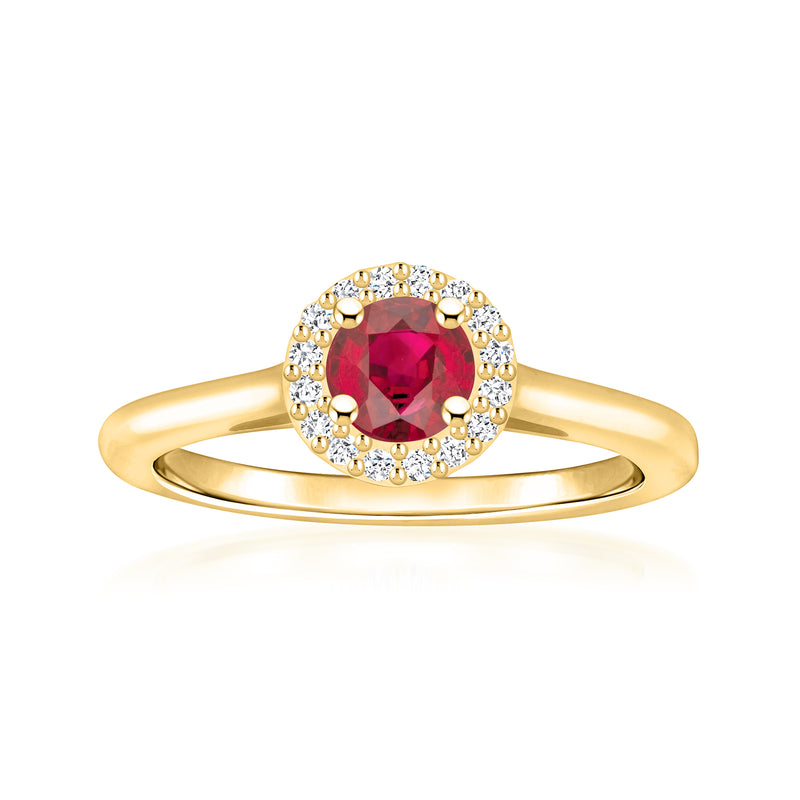 14kt yellow gold ring with oval ruby center and round diamond halo accents