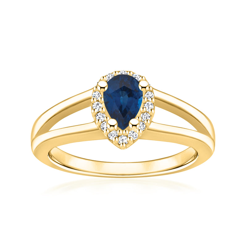 14kt yellow gold ring with oval blue sapphire and round diamond halo