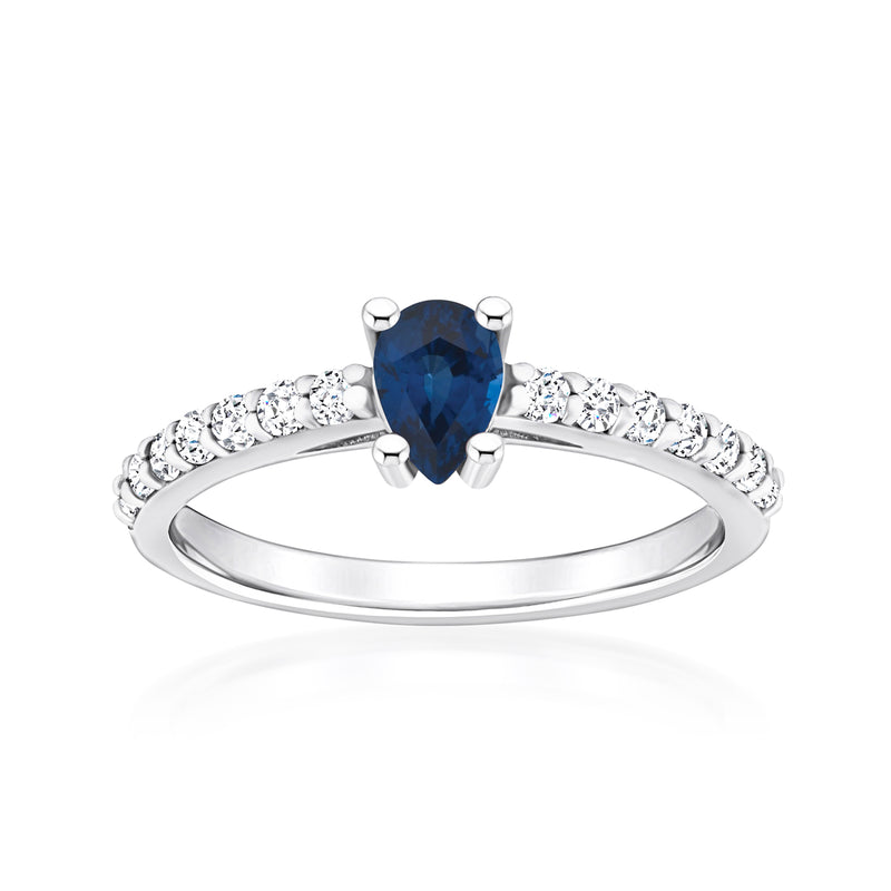 Sapphire ring with pear-cut center stone and diamond accents in white gold