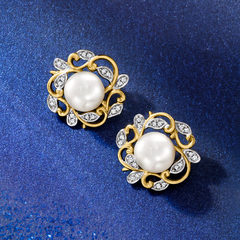 Yellow gold pearl stud earrings with diamond leaf details and round post
